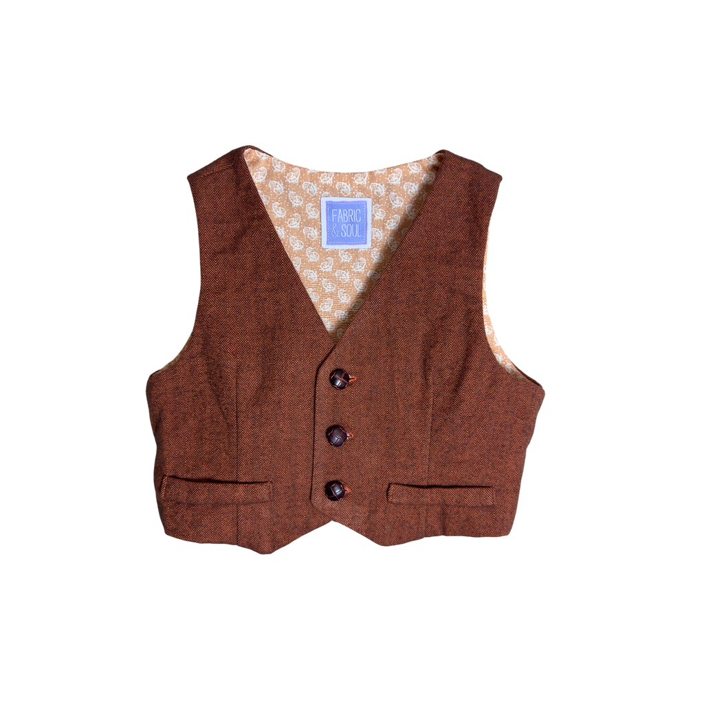 Heritage Rust vest with brown leather-looking buttons showing lining