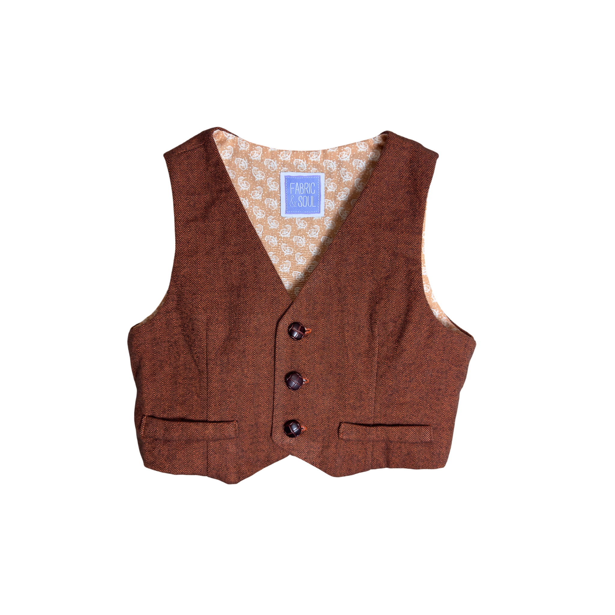 Heritage Rust vest with brown leather-looking buttons showing lining