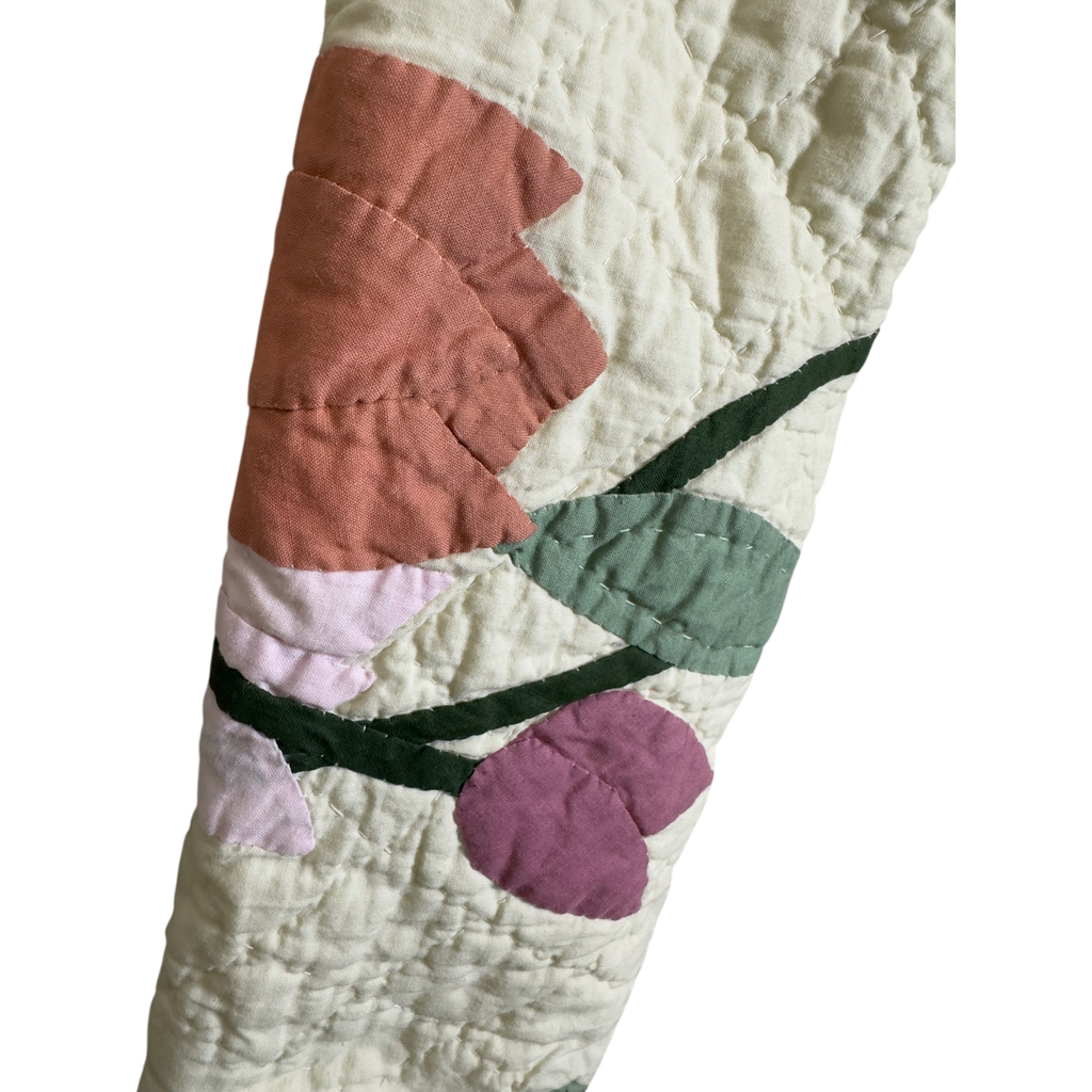 Close-up of floral quilt fabric on handmade artisan jacket, Fabric & Soul Cotuit MA
