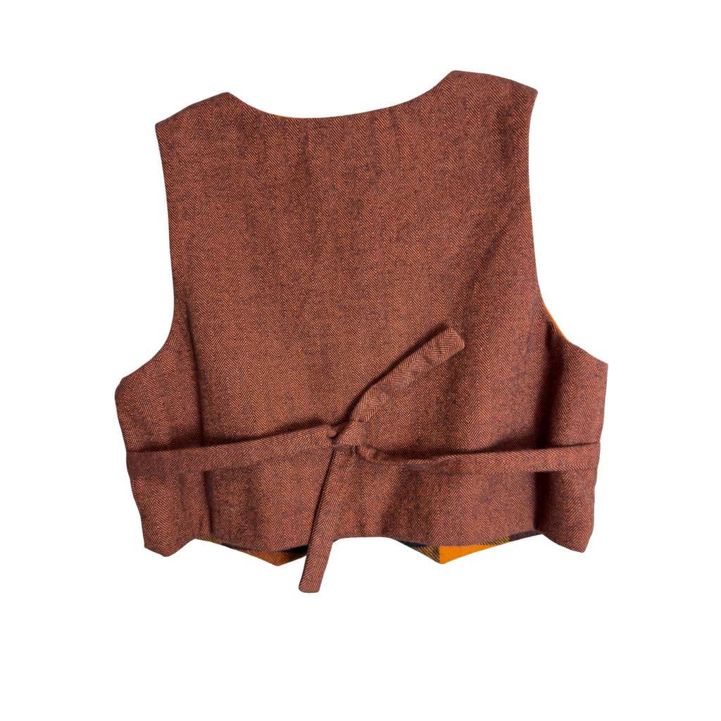 Back view of Heritage Rust vest showing ties for custom fit