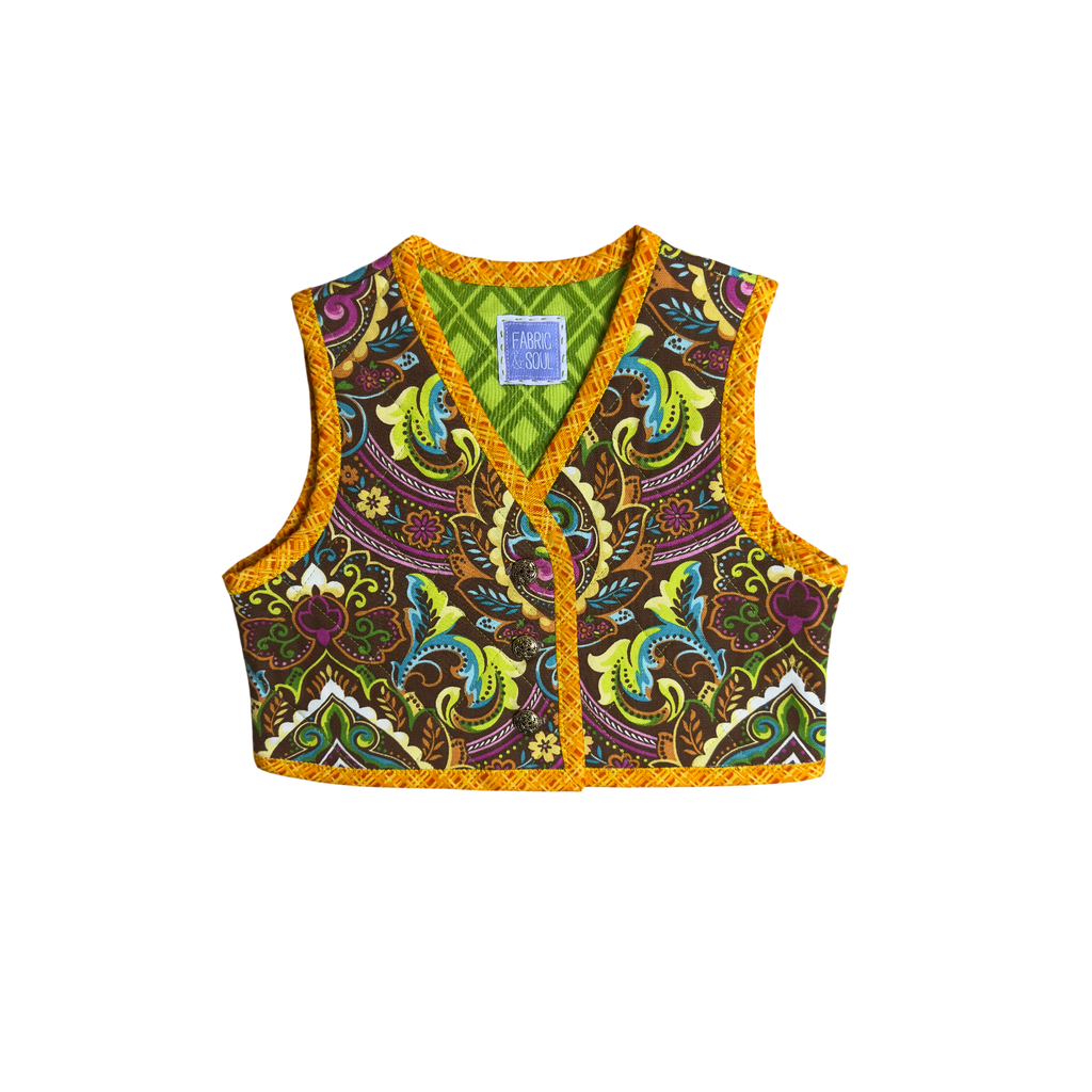 Front view of kids vest with orange binding
