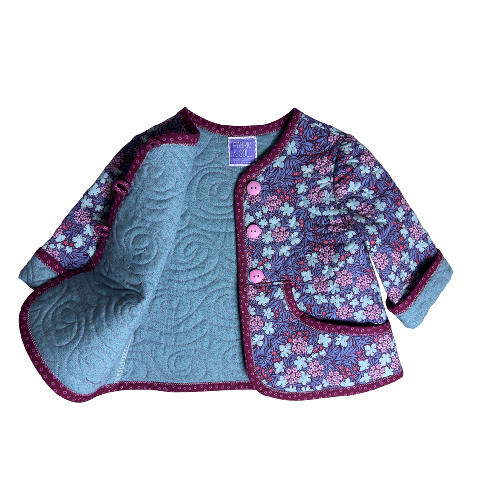 Close-up of floral cotton fabric and quilting detail