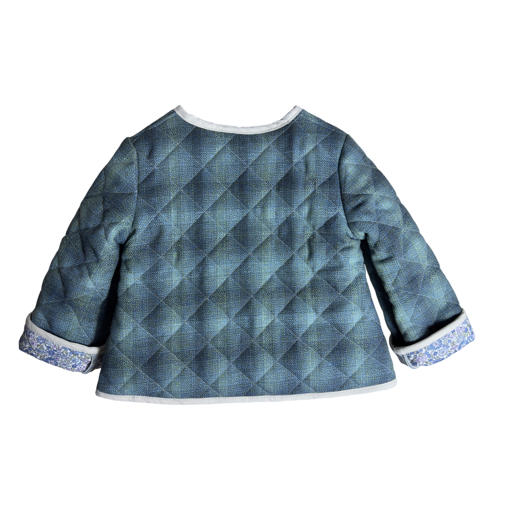 Back view of handmade and quilted  wool jacket with Liberty of London lining