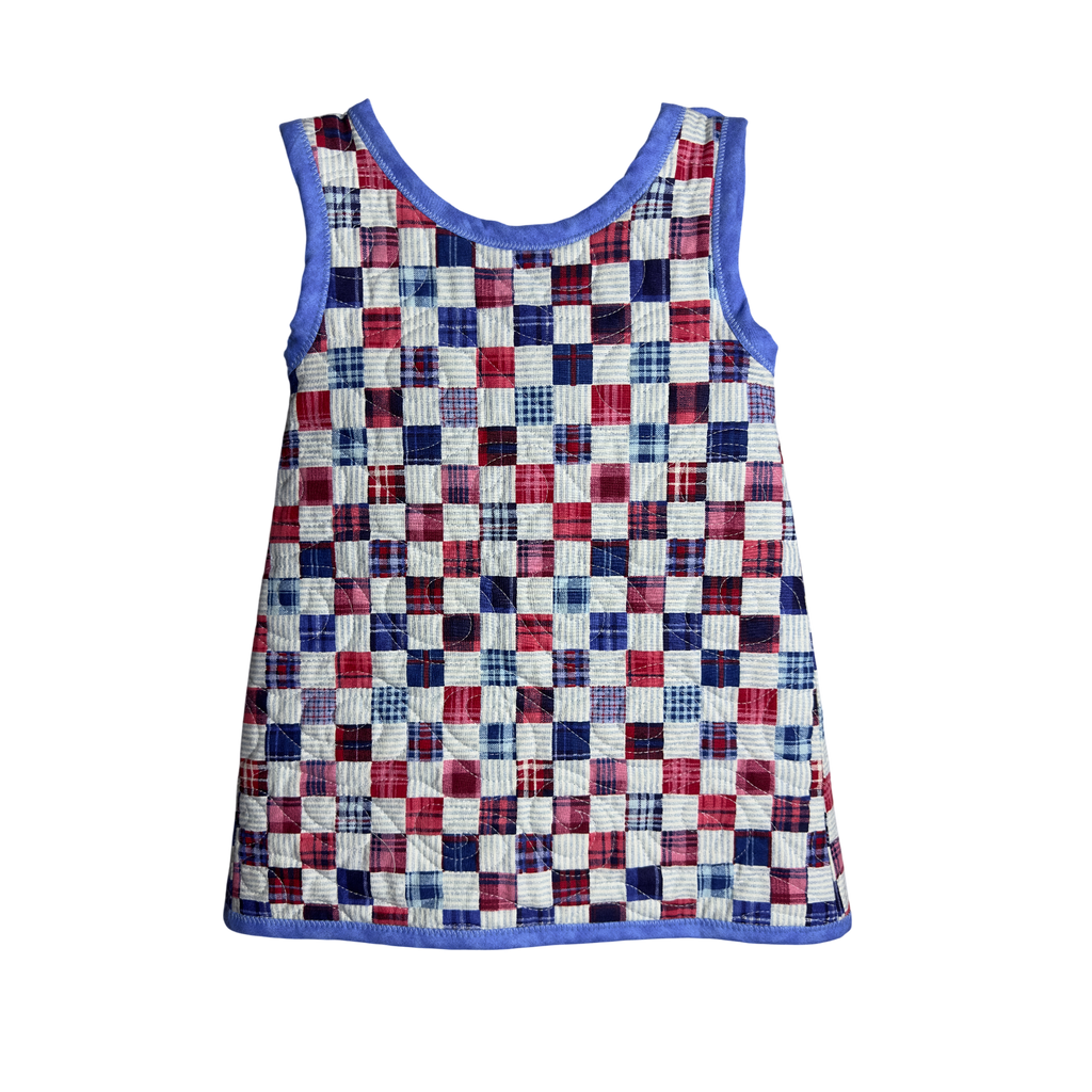 Child wearing Regatta wrap jumper quilted cotton dress