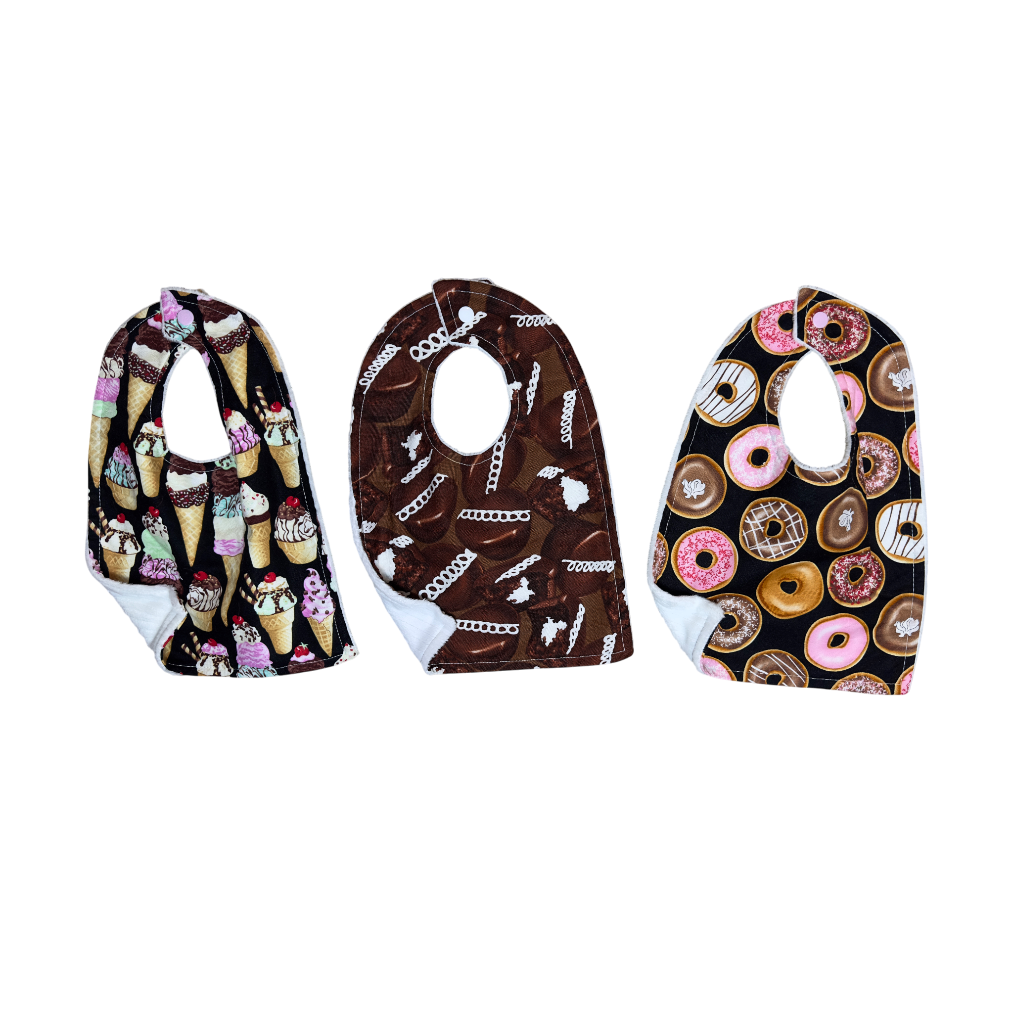 Handmade baby bib set of three with ice cream cones, cupcakes, and decorated donuts on quilting cotton with soft white backing