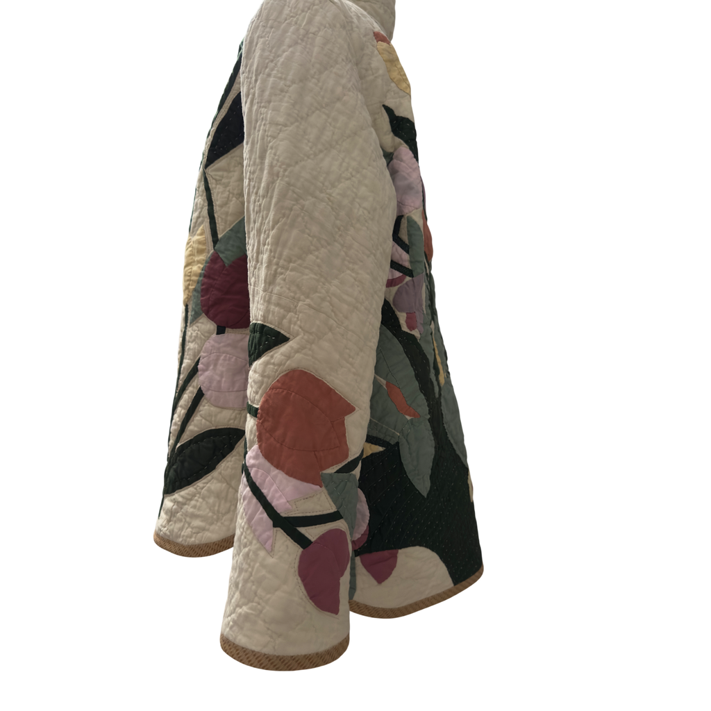 Side view showing jacket fit and quilted texture