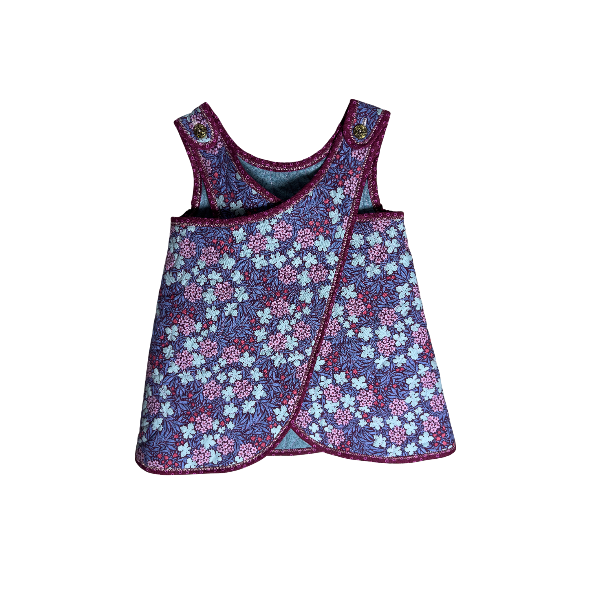 Detail of quilted cotton fabrics and wrap closure