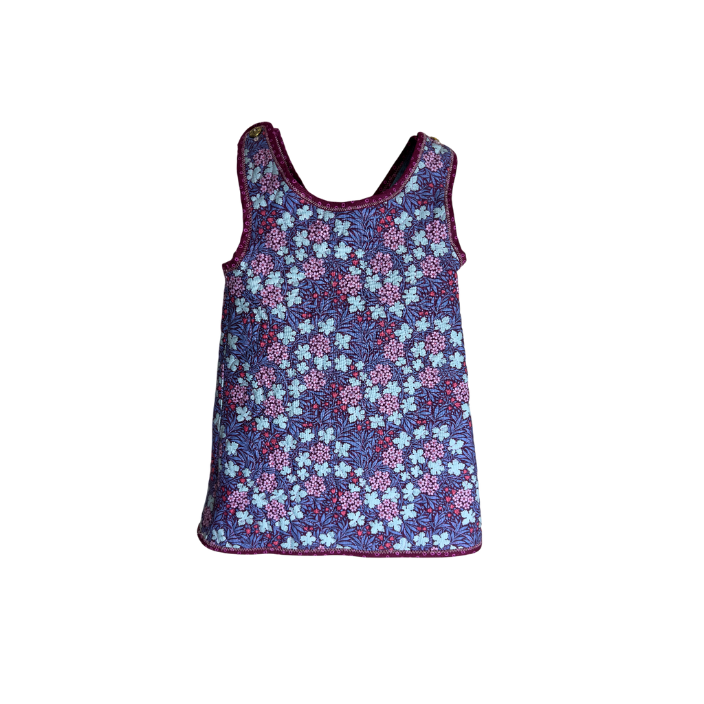 Front view of elegant wrap-style jumper for children